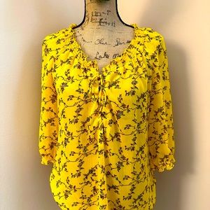 Summer gauze fabric sheer blouse. Gathered neck with lace up front.